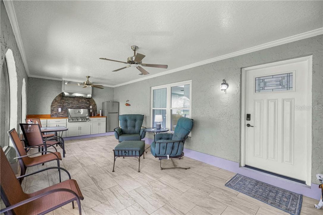 front entry patio, beautifully done with outdoor kitchen/grill space - 12014 W Dolphin CT, HOMOSASSA FL 34448
