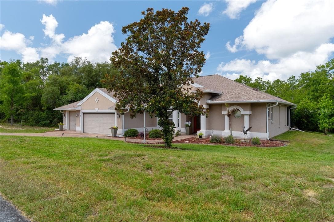 Single Family Residence at 12 HACKBERRY DR, HOMOSASSA FL 34446, photo 2 of 76