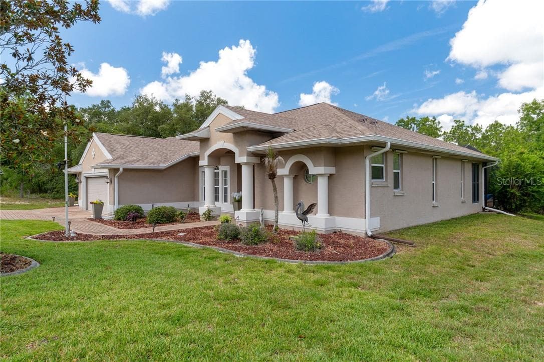 Single Family Residence at 12 HACKBERRY DR, HOMOSASSA FL 34446, photo 3 of 76
