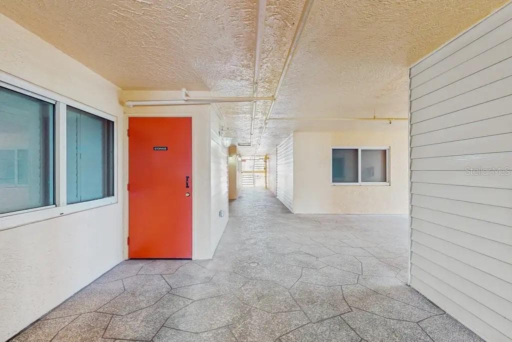 SEPARATE PRIVATE STORAGE ROOM OUTSIDE YOUR UNIT FOR ALL YOUR BEACH ESSENTIALS. - 18400 GULF BLVD #1208, INDIAN SHORES