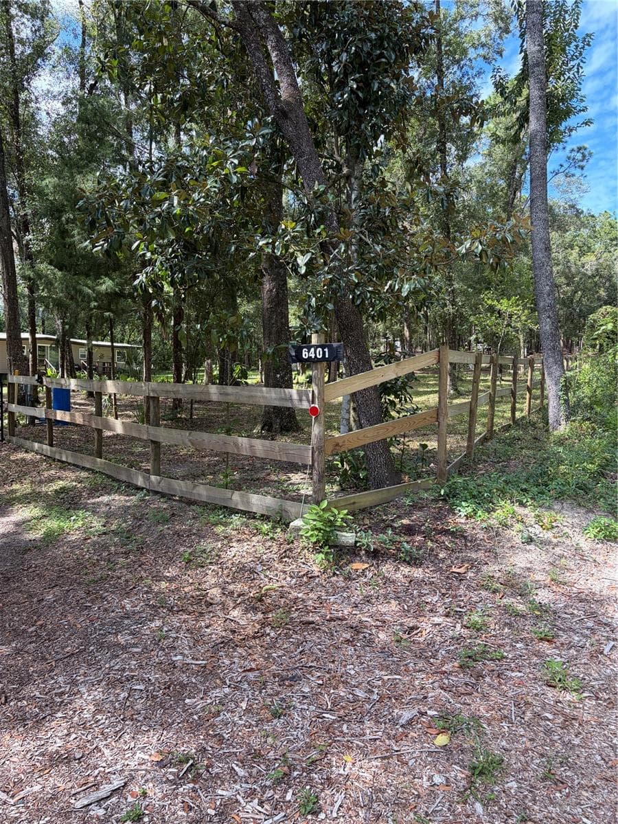 near front gated entrance - 6401 SUNNYSIDE RANCH RD, BROOKSVILLE