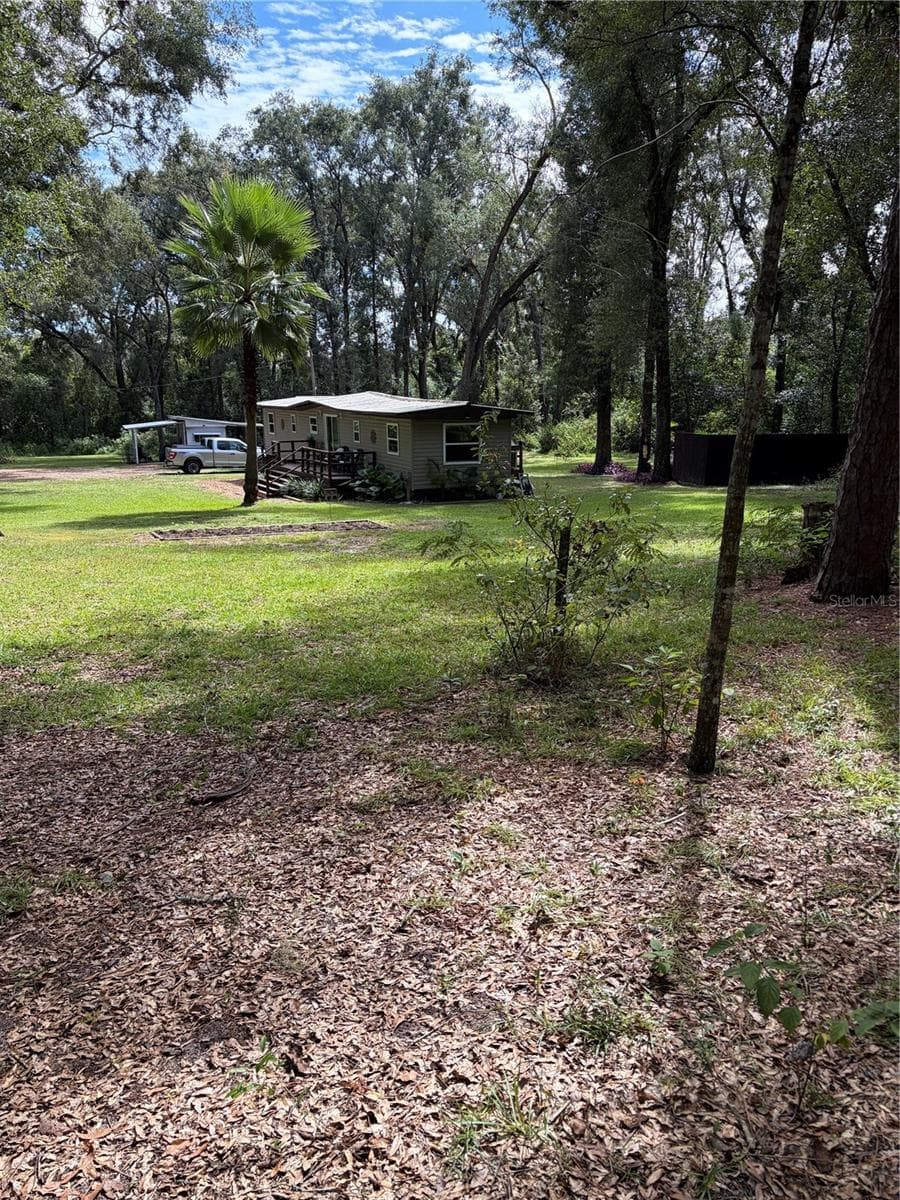 2/2 mobile home with 1/1 rv that can be used for guests, rentable, or friends and family - 6401 SUNNYSIDE RANCH RD, BROOKSVILLE