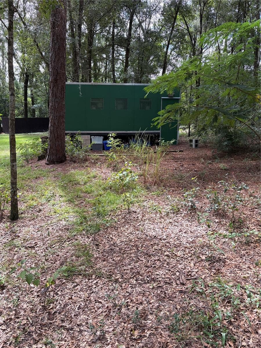 steel 18 x 12 storage stays with property.  Could be made into a tiny home - 6401 SUNNYSIDE RANCH RD, BROOKSVILLE
