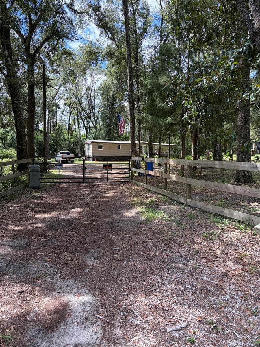 main entrance - 6401 SUNNYSIDE RANCH RD, BROOKSVILLE