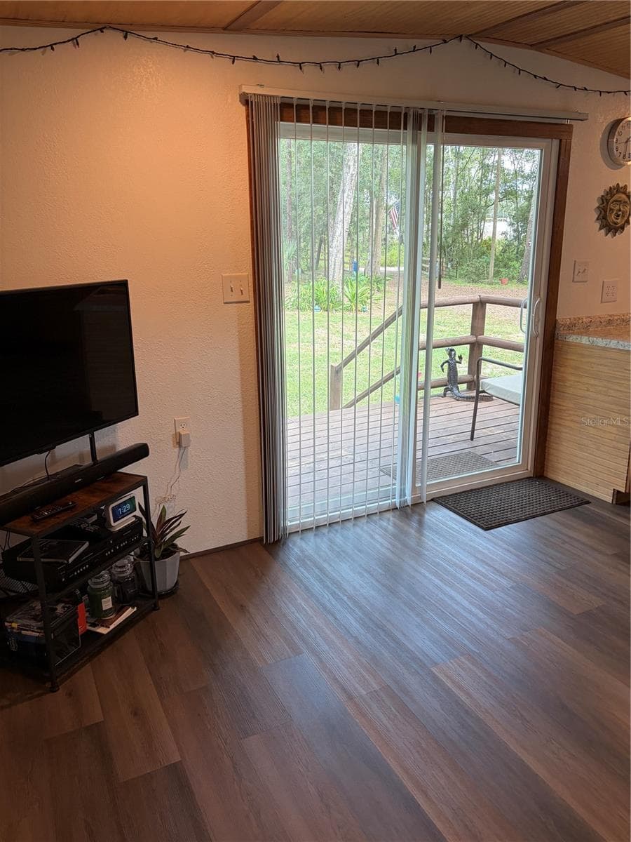 still living room - 6401 SUNNYSIDE RANCH RD, BROOKSVILLE