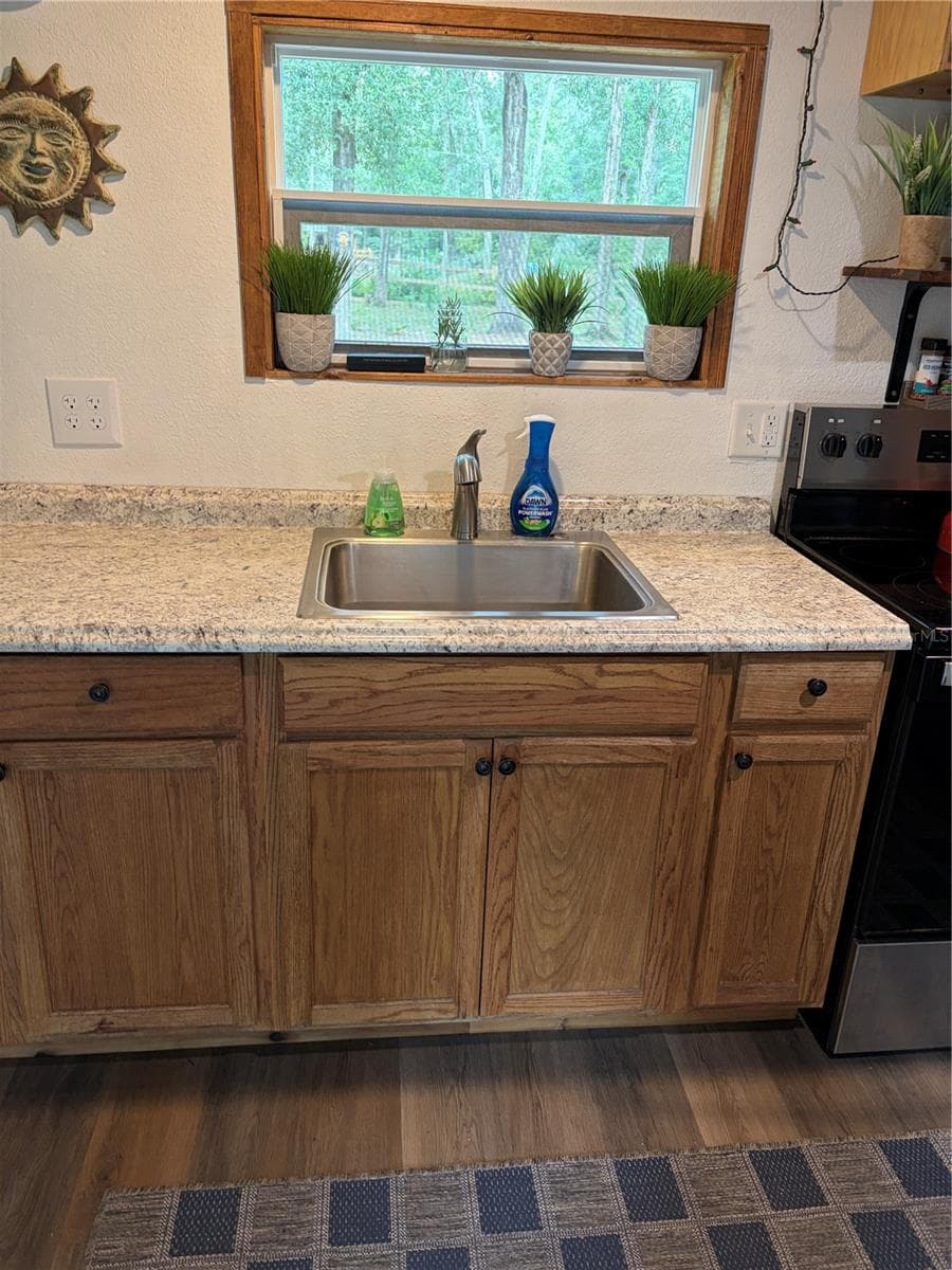 kitchen with garbage disposal/stainless sink - 6401 SUNNYSIDE RANCH RD, BROOKSVILLE