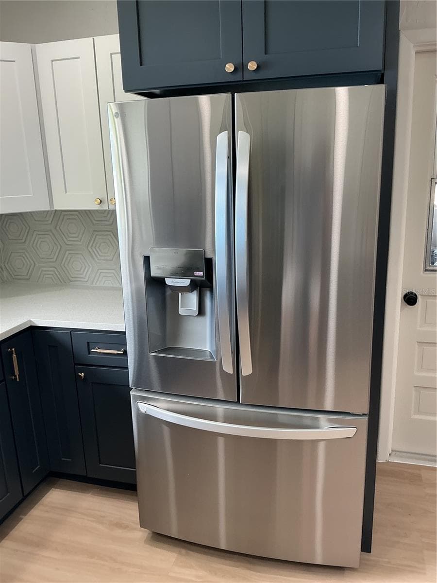 Large French door refrigerator. - 5901 25TH ST S, ST PETERSBURG
