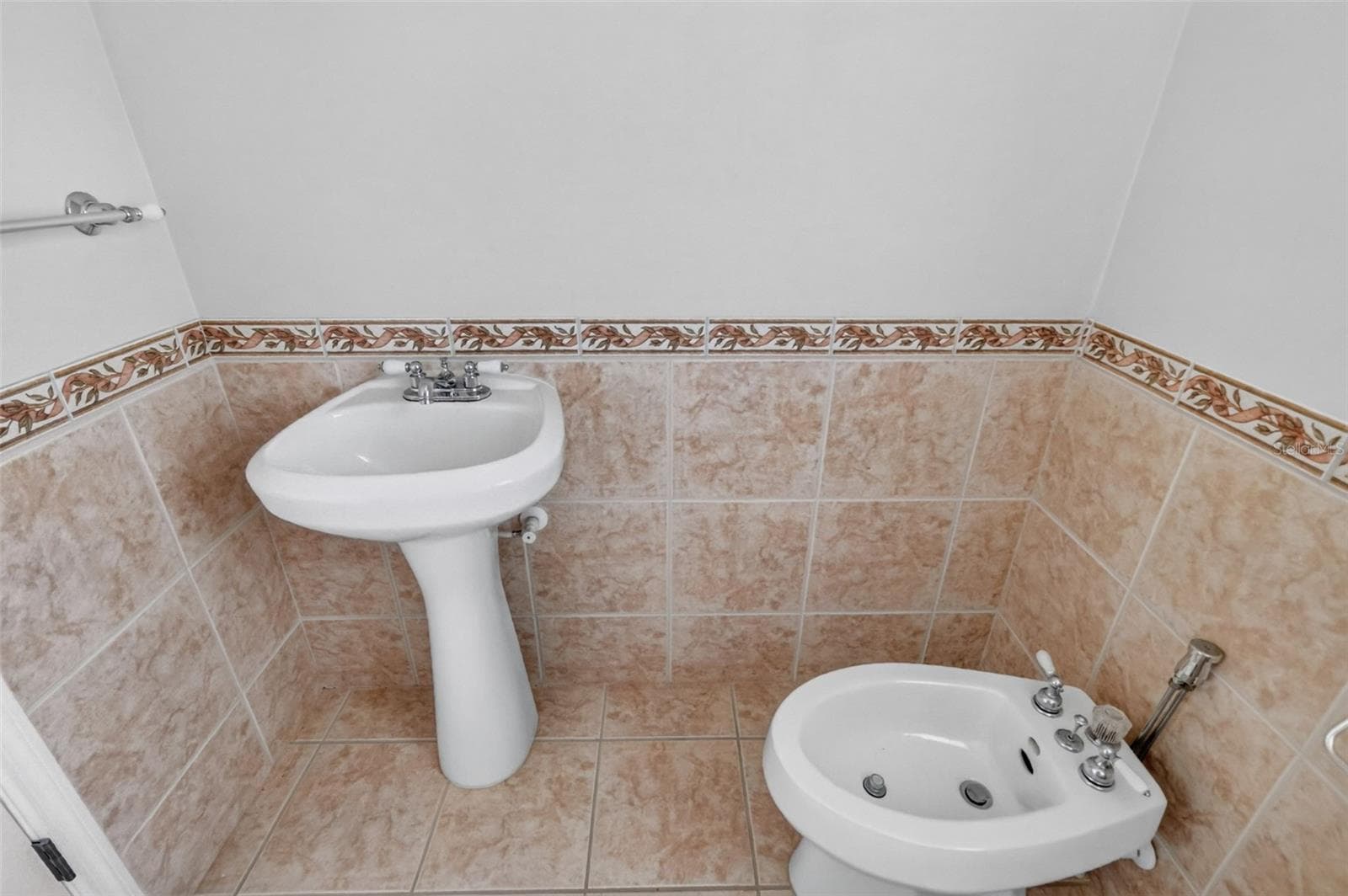 Primary Bathroom Private Water Closet, Bidet, and Sink - 2334 AMBLER CIR, THE VILLAGES