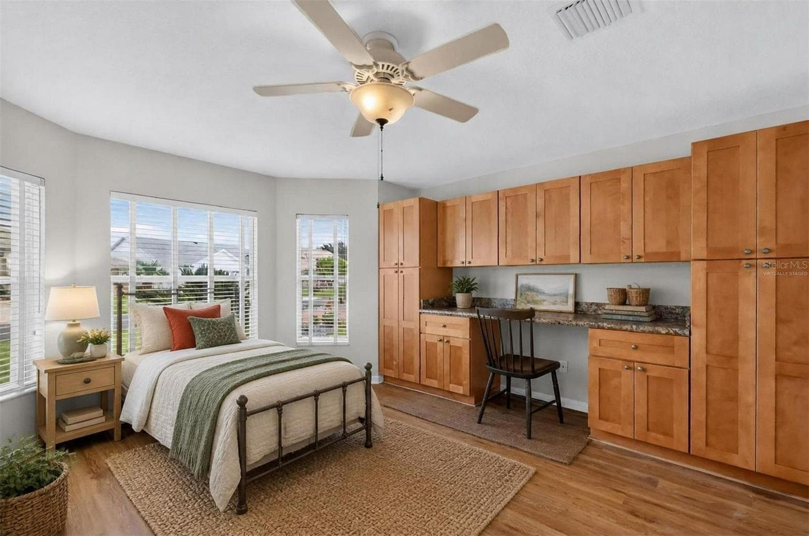 Second Bedroom with Custom Desk and Cabinetry-Virtually Staged - 2334 AMBLER CIR, THE VILLAGES