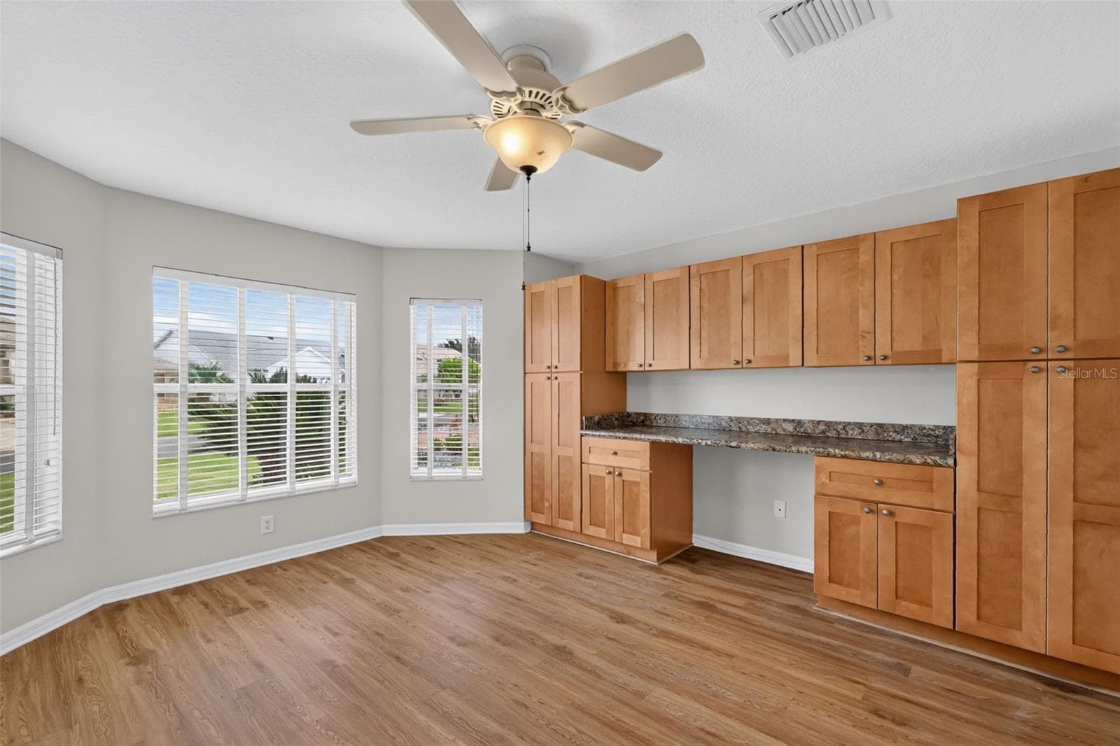Second Bedroom with Custom Desk and Cabinetry - 2334 AMBLER CIR, THE VILLAGES
