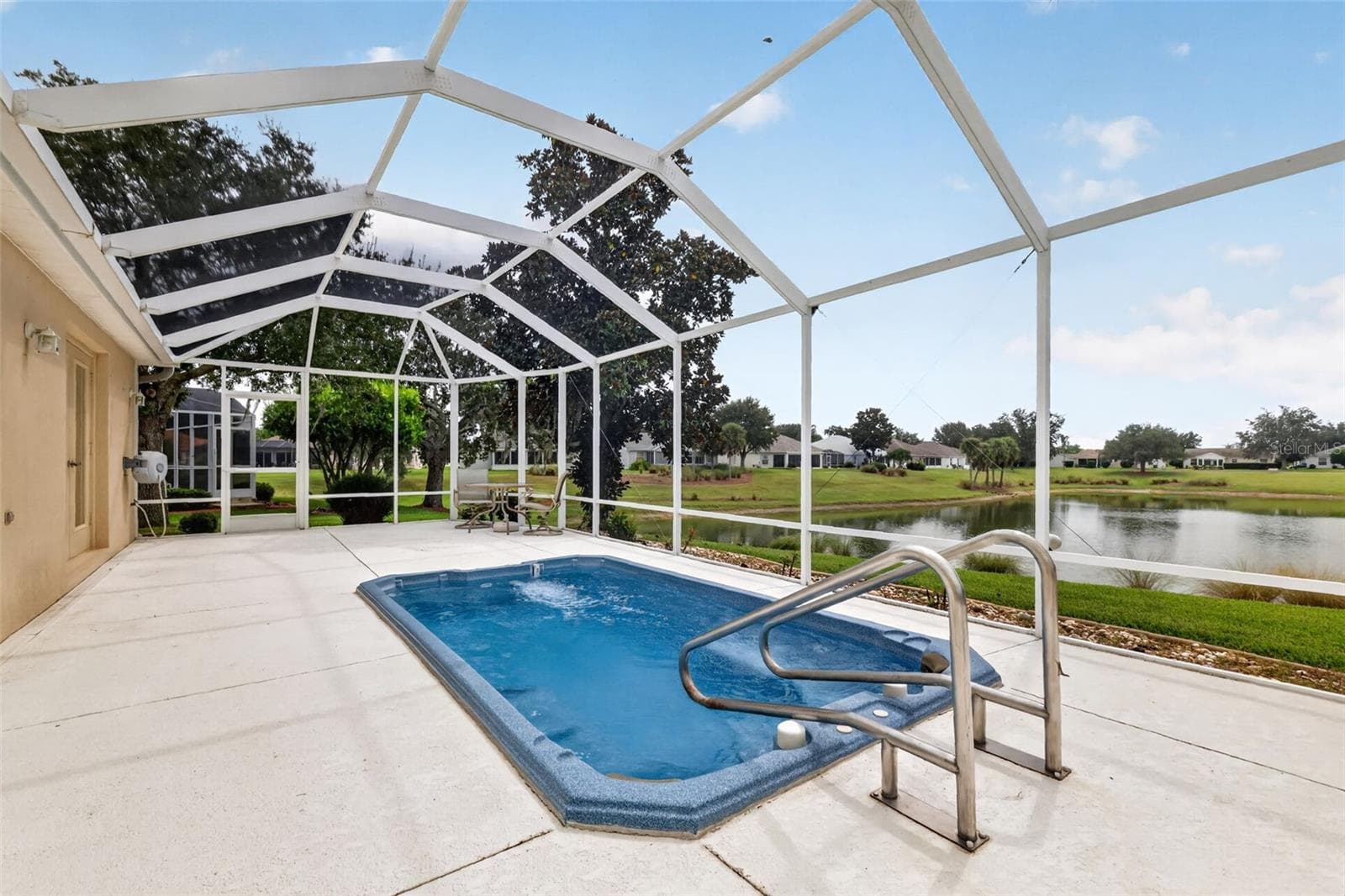 Expansive 756sf Birdcage with Swim Spa and Incredible Water Views! - 2334 AMBLER CIR, THE VILLAGES