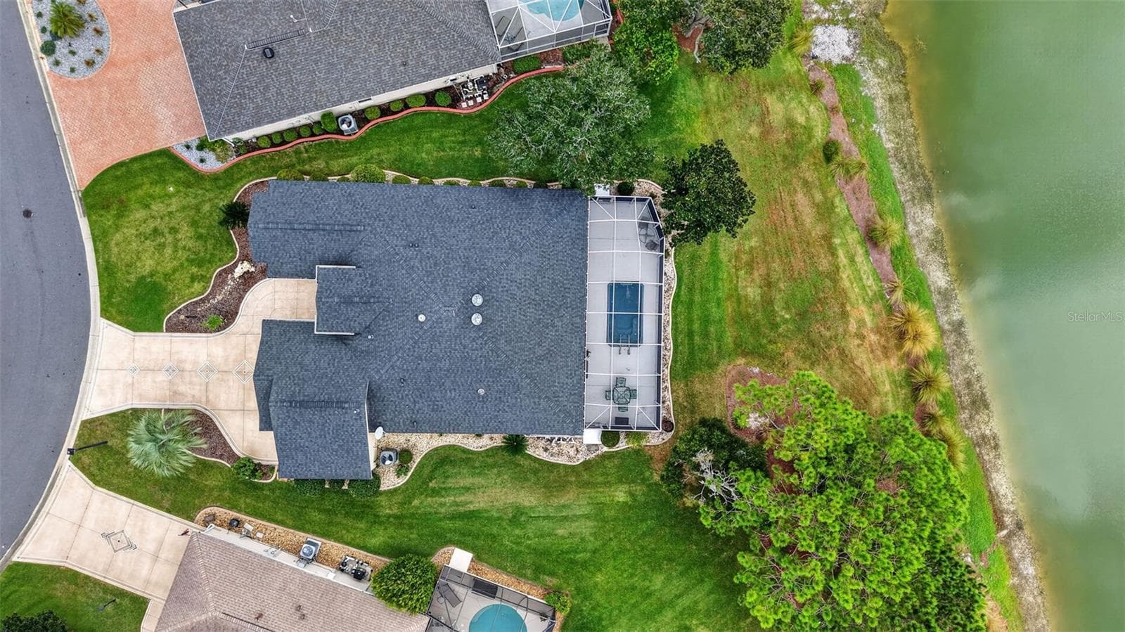 Aerial Side Elevation with Waterfront Views - 2334 AMBLER CIR, THE VILLAGES