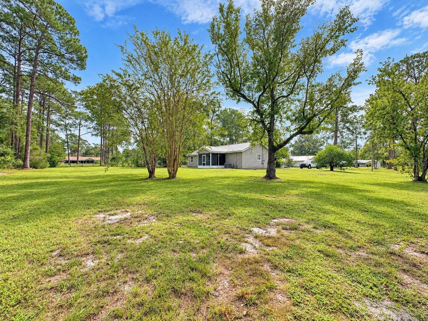 Single Family Residence at 14641 NE 154TH ST, FORT MC COY, photo 8 of 38