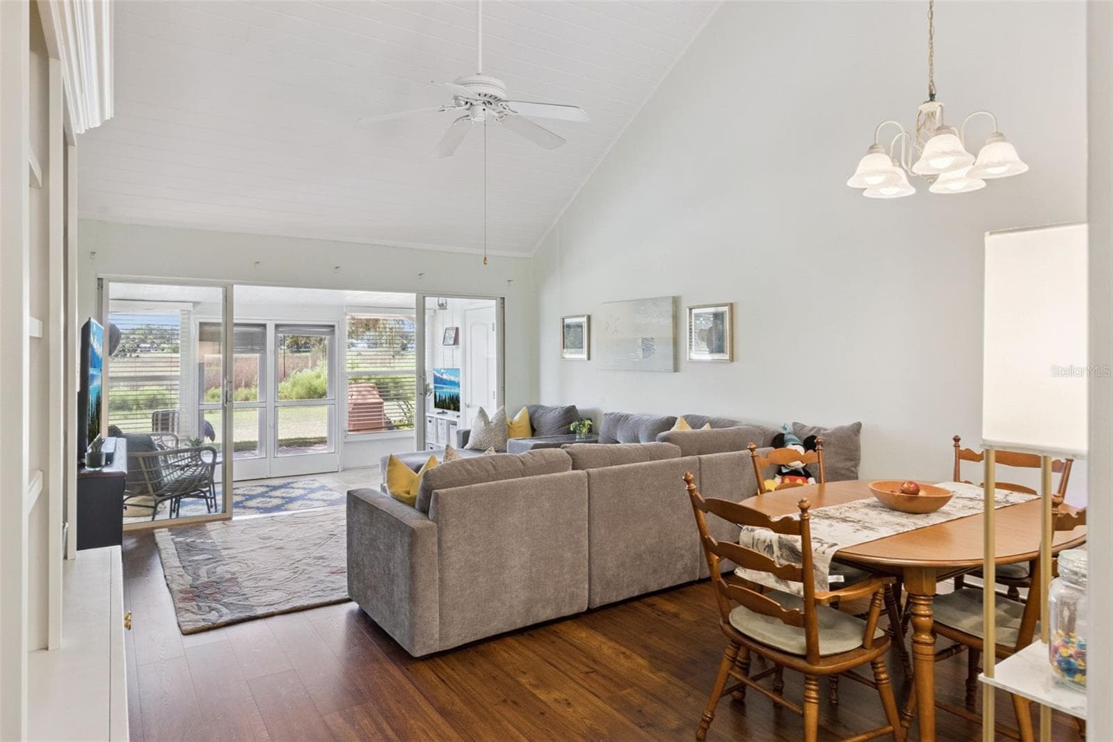 Cathedral ceiling and no carpeting add to the polished feeling of this home. - 1066 VILLA LN #63, APOPKA
