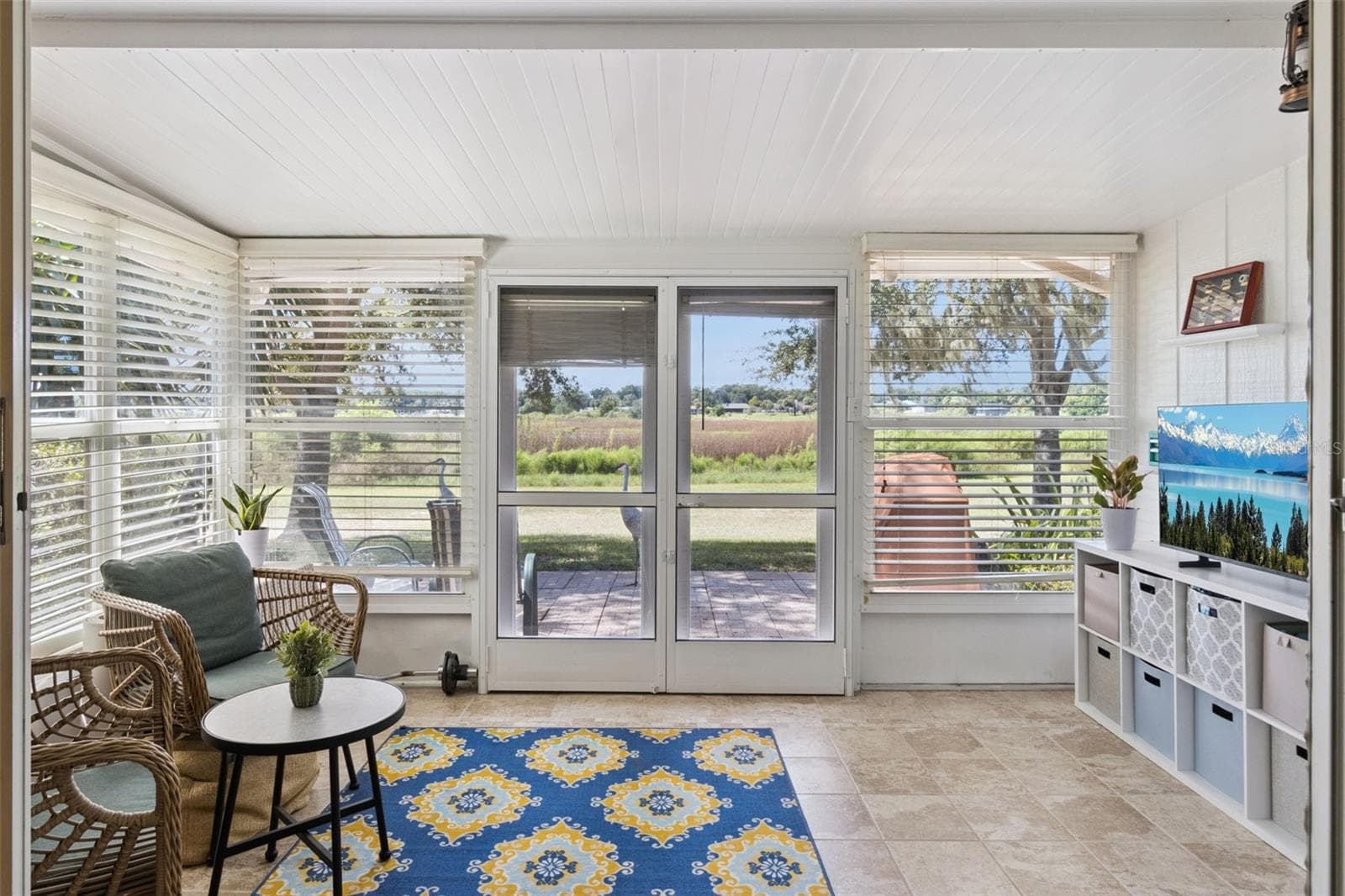 An entire "art wall" is an open vista and large lake view. - 1066 VILLA LN #63, APOPKA