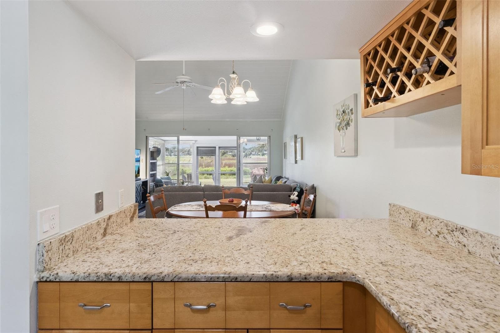 Breakfast bar is brimming with extra counter space. - 1066 VILLA LN #63, APOPKA