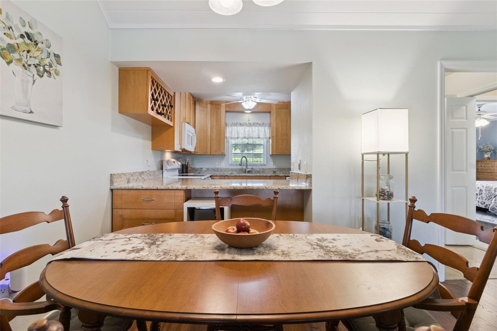Multiple comfy places for meals, conversations and game-play. - 1066 VILLA LN #63, APOPKA