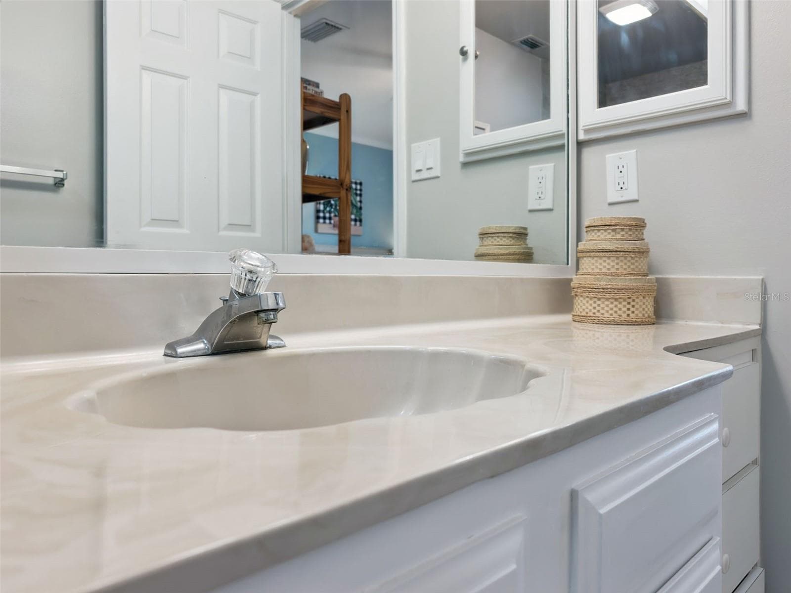 Spacious en suite bath features an easy-clean integral sink. - 1066 VILLA LN #63, APOPKA