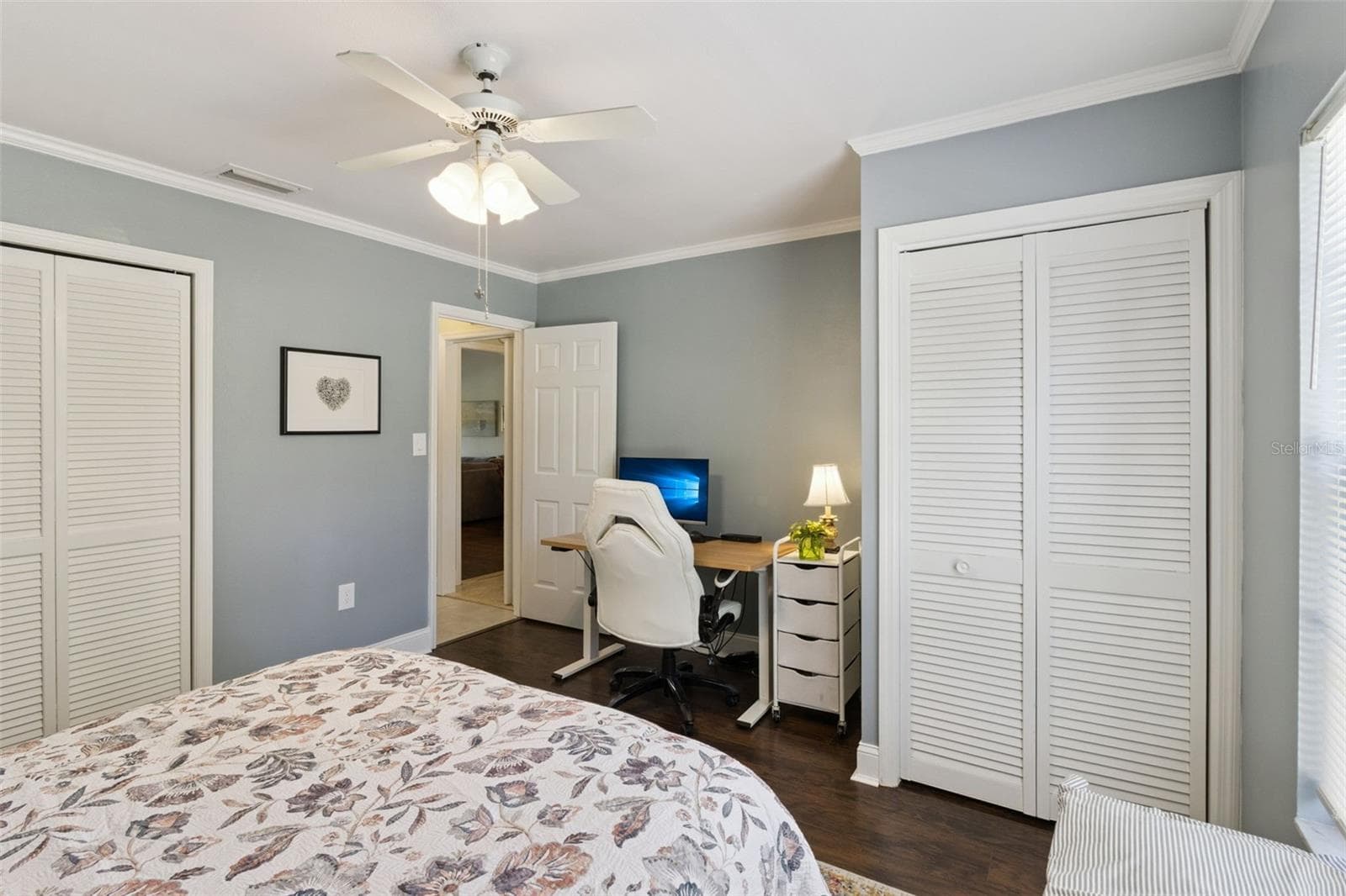 Secondary bedroom has two closets and no carpet. - 1066 VILLA LN #63, APOPKA