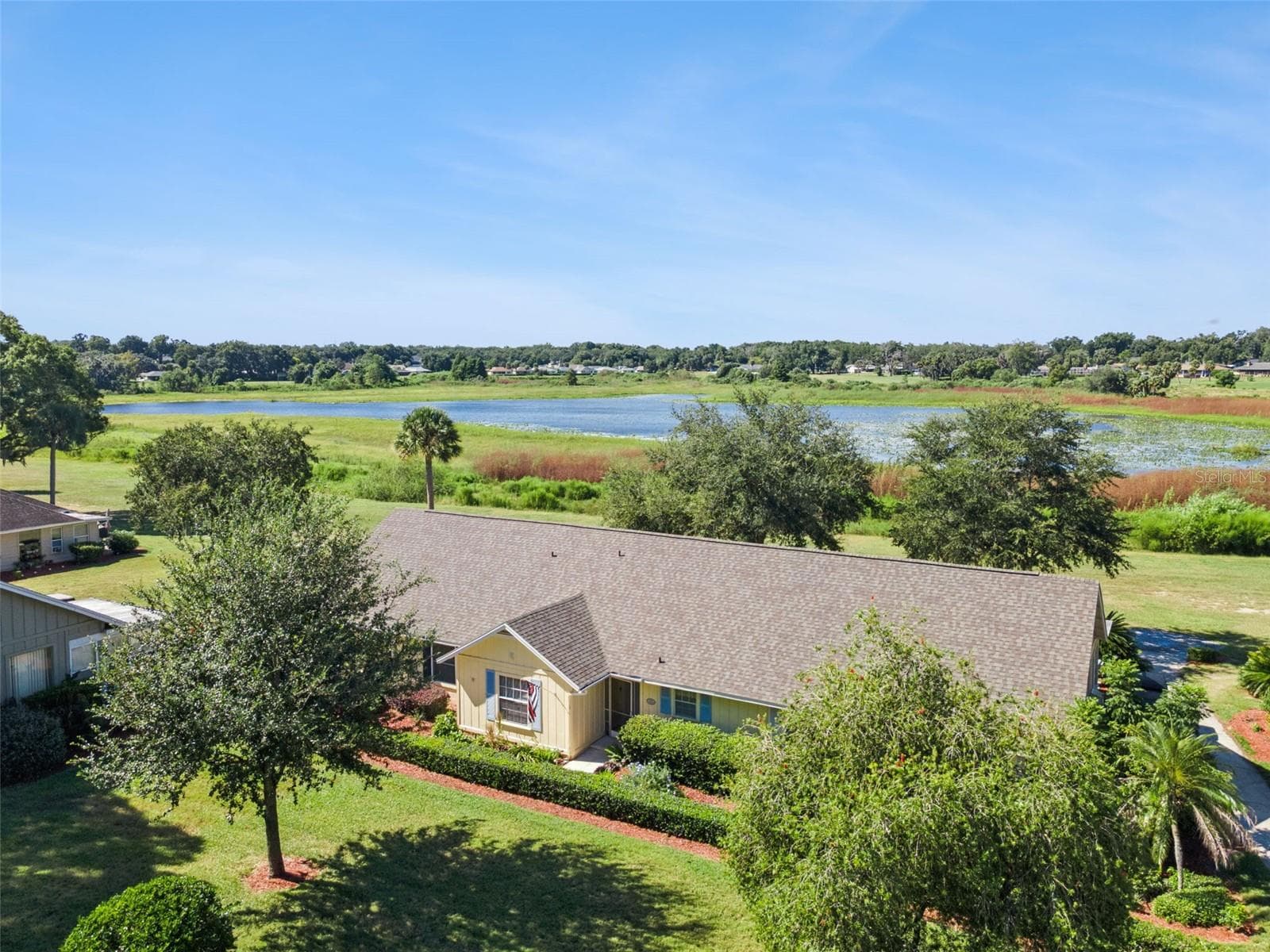 Some homes have a view. This one has a nightly show of the setting sun. - 1066 VILLA LN #63, APOPKA