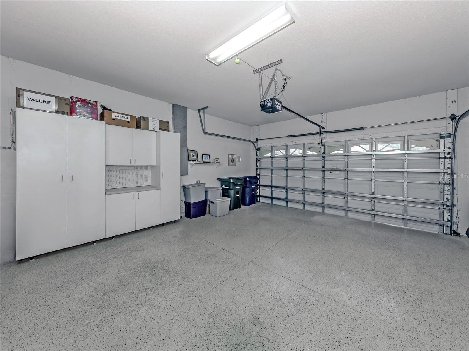 Large size Gararge with storage cabinets and trek flooring - 20684 CAPELLO DR, VENICE