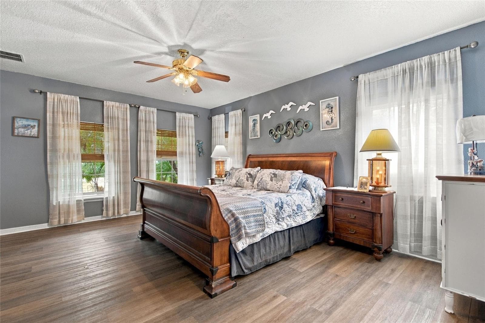Primary bedroom is located on the first floor and is very spacious. - 3850 GRANADA DR, INDIAN LAKE ESTATES