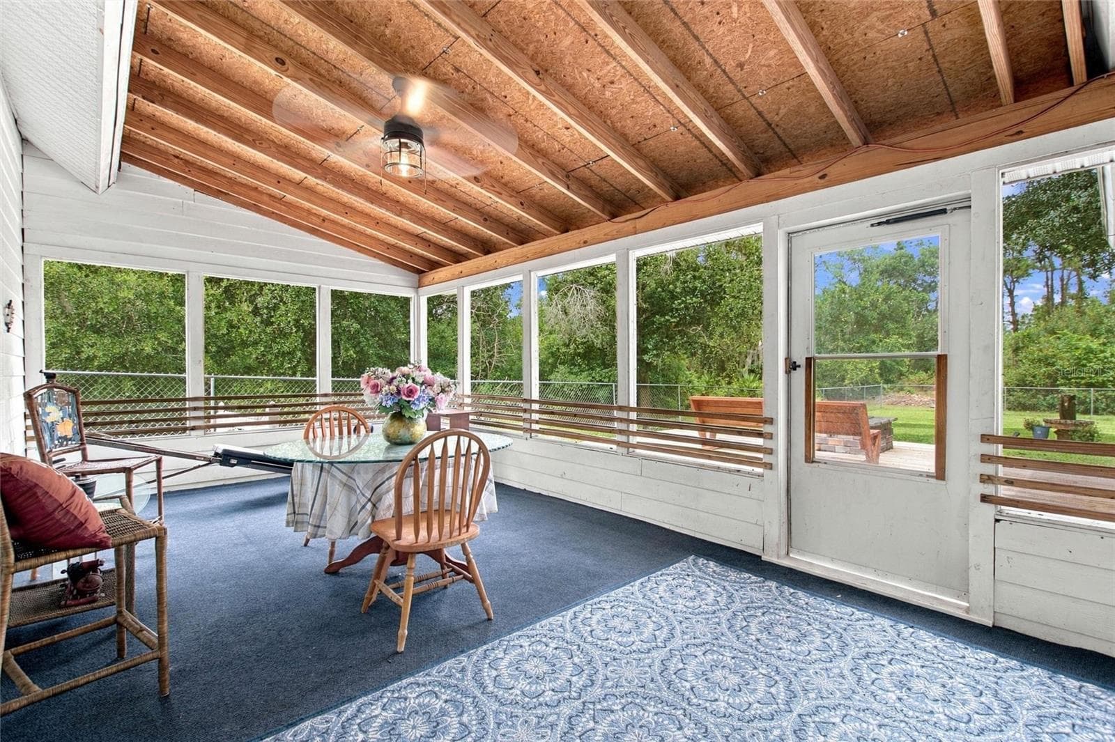 Enclosed patio that is located off of the living area. - 3850 GRANADA DR, INDIAN LAKE ESTATES