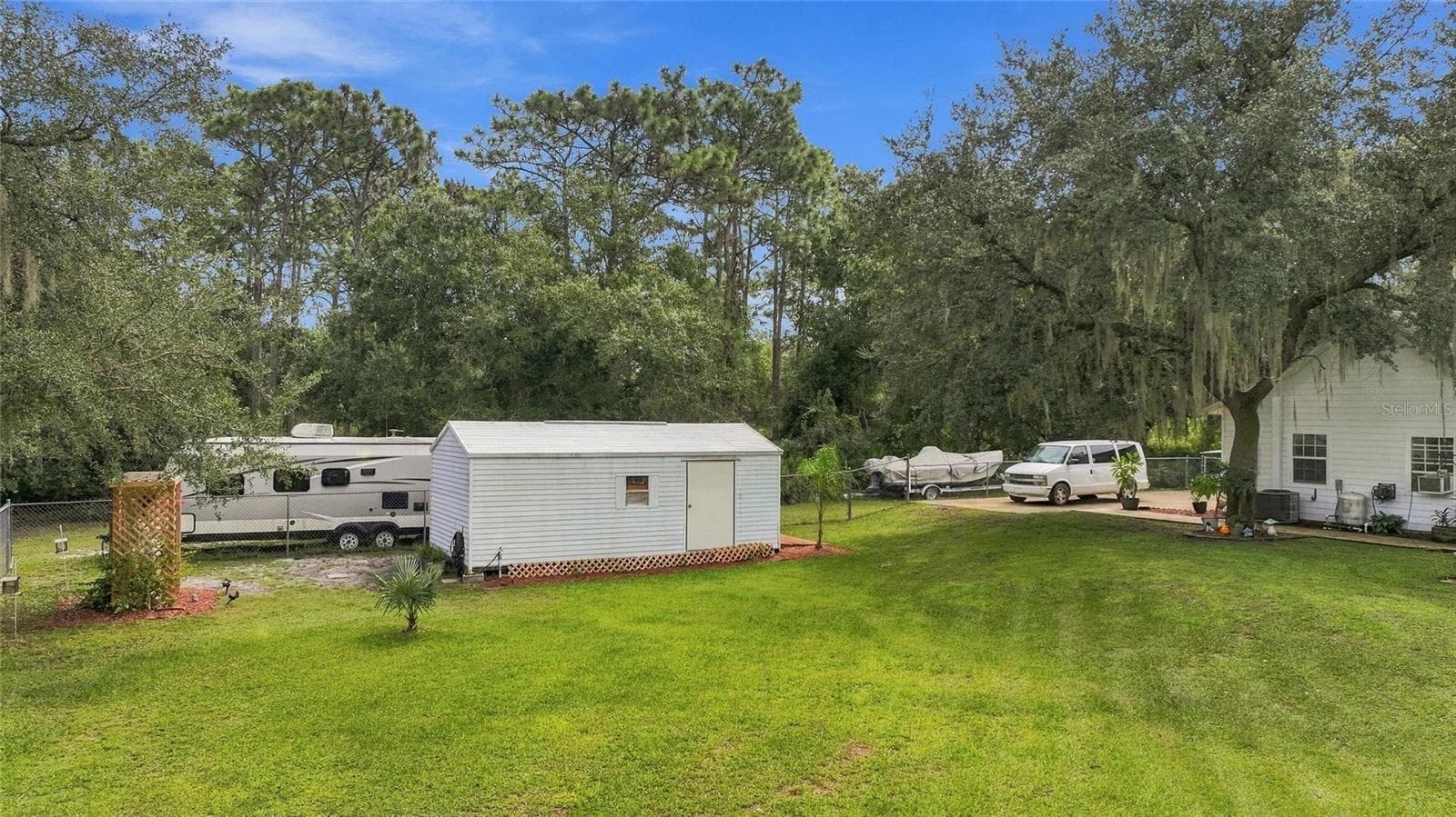 Storage shed located in the back yard. - 3850 GRANADA DR, INDIAN LAKE ESTATES