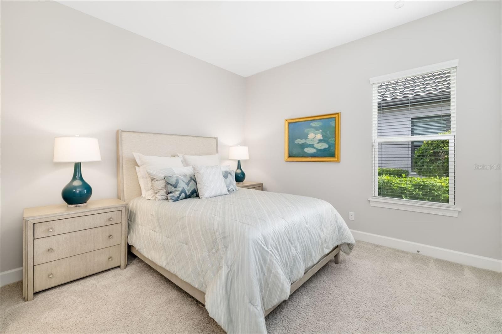The third ensuite bedroom offers a custom closet, and ensuite bathroom with large shower - 12807 SORRENTO WAY, BRADENTON