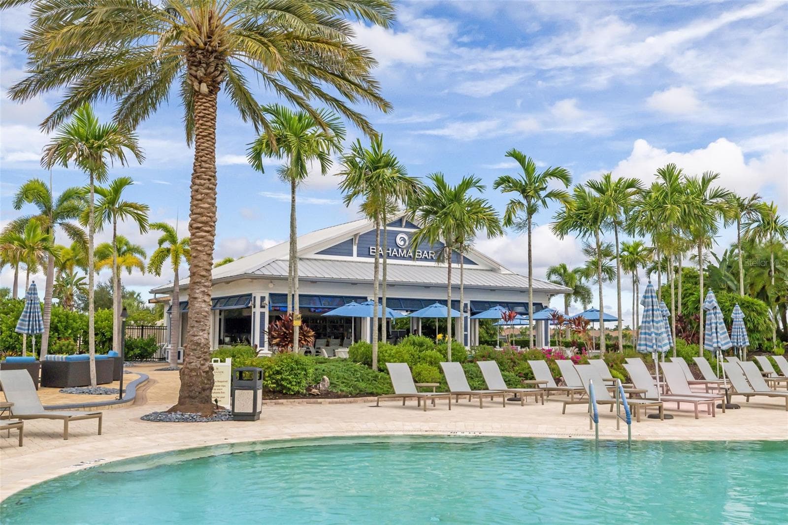 View from the pool to the Bahama Bar - 12807 SORRENTO WAY, BRADENTON