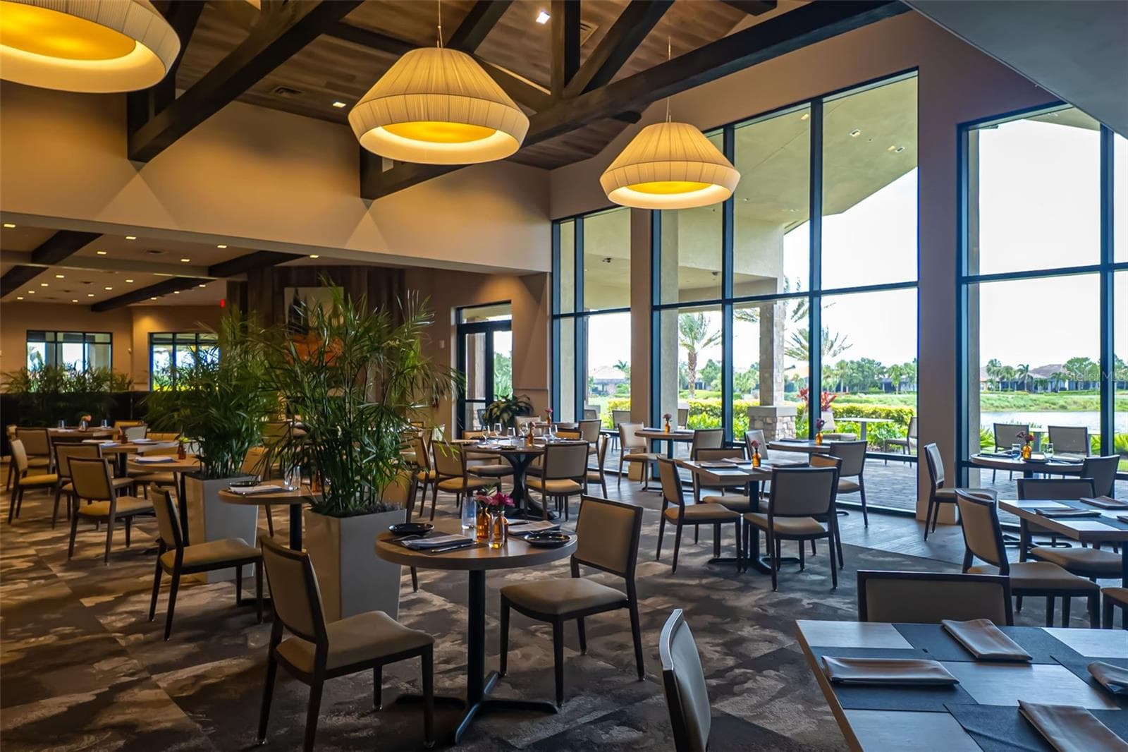 The main dining room which over looks the beautifiul vista of the 18th fairway. - 12807 SORRENTO WAY, BRADENTON