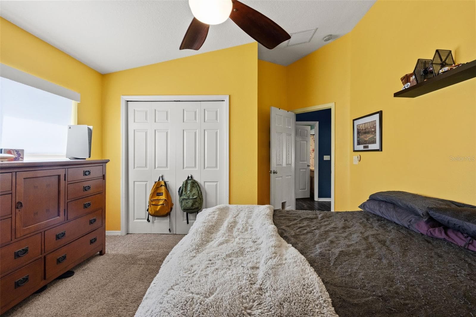 Comfortable proportions, natural light, and a full-size closet make this secondary bedroom both functional and inviting. - 1419 BLUE MARLIN BLVD, HOLIDAY