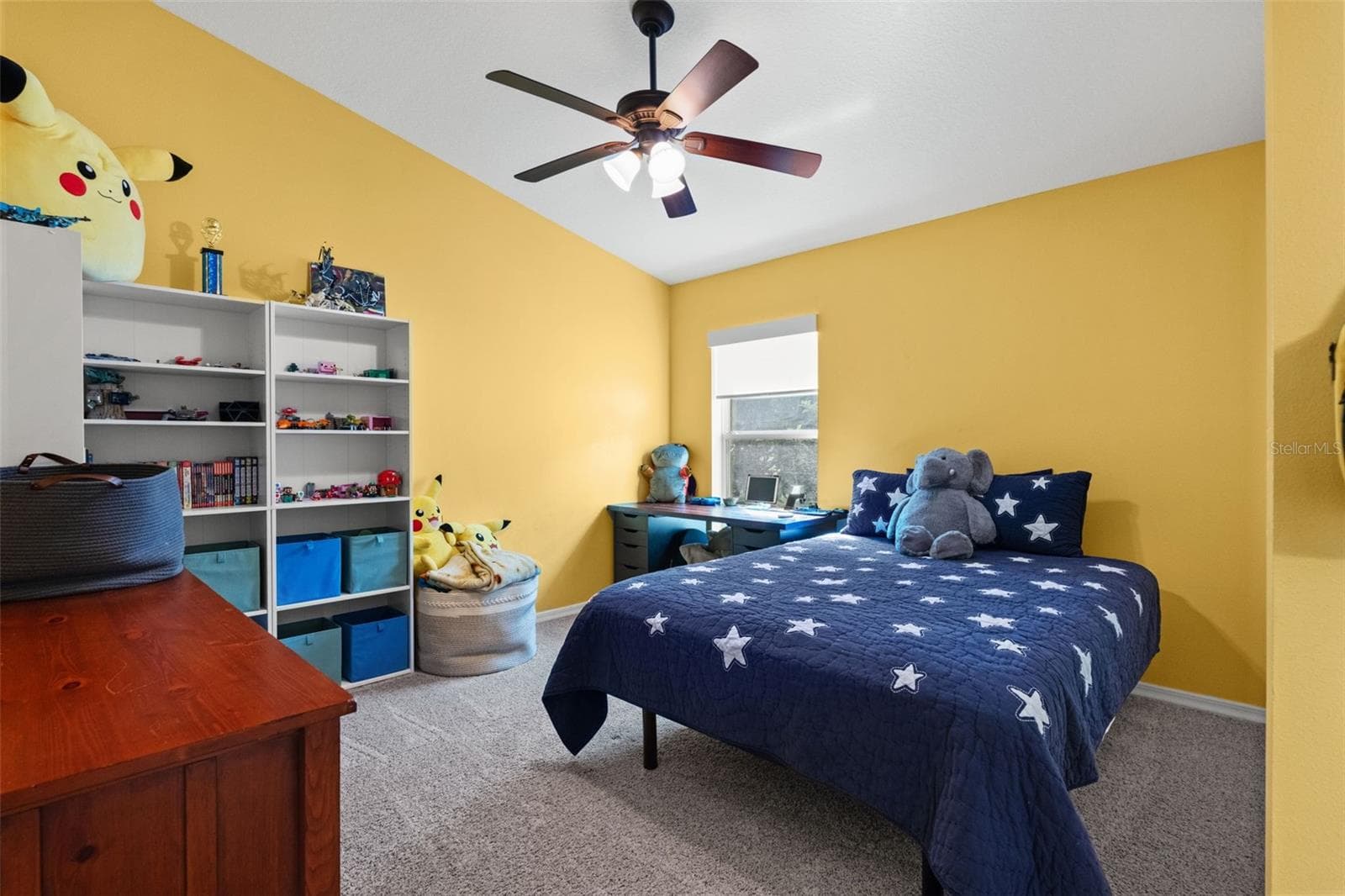Another spacious secondary bedroom offers plenty of room for a full furniture arrangement and personal touches. - 1419 BLUE MARLIN BLVD, HOLIDAY