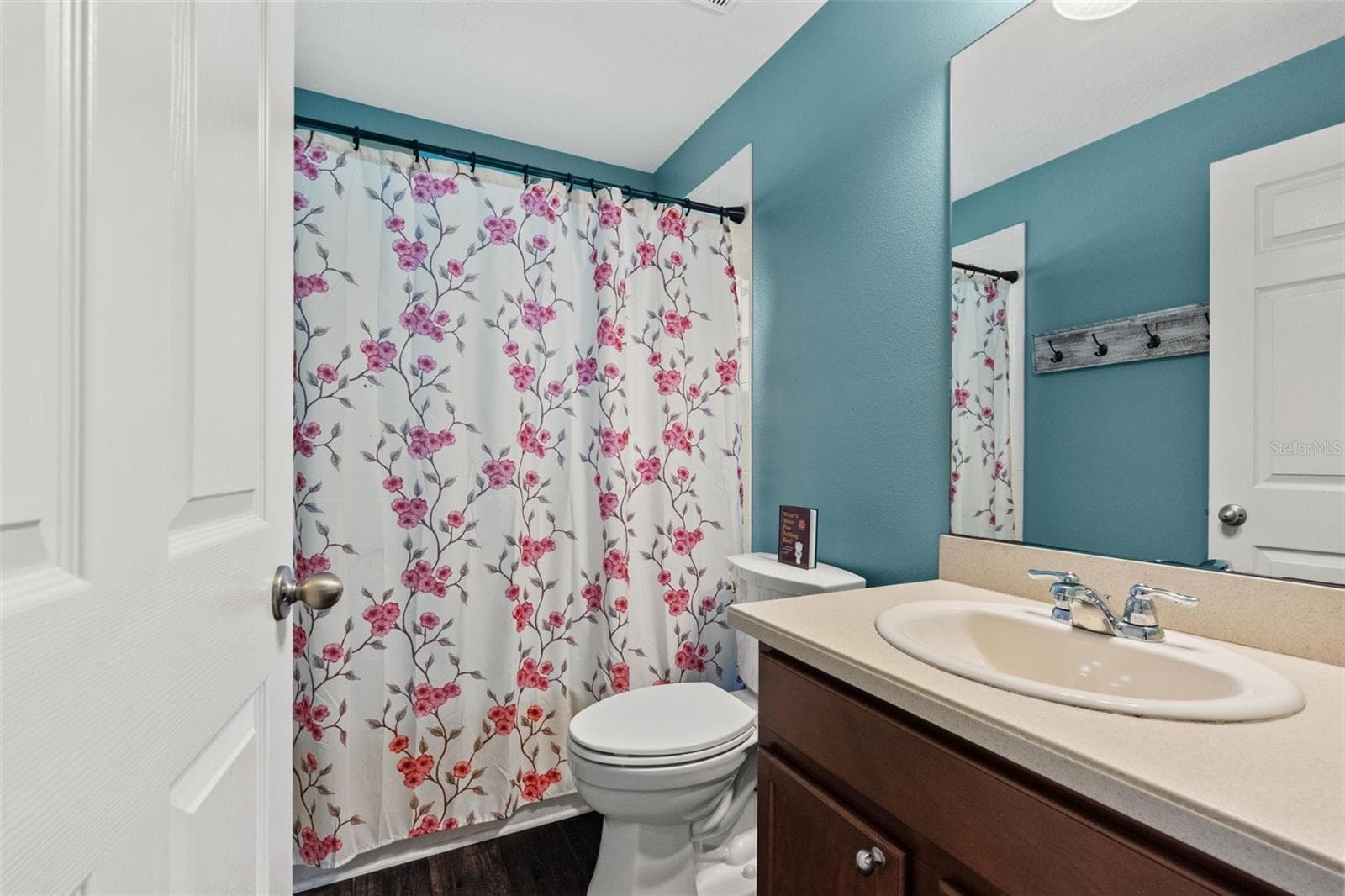 With 3 full baths, the home offers added convenience for busy mornings, overnight guests, and everyday living. - 1419 BLUE MARLIN BLVD, HOLIDAY