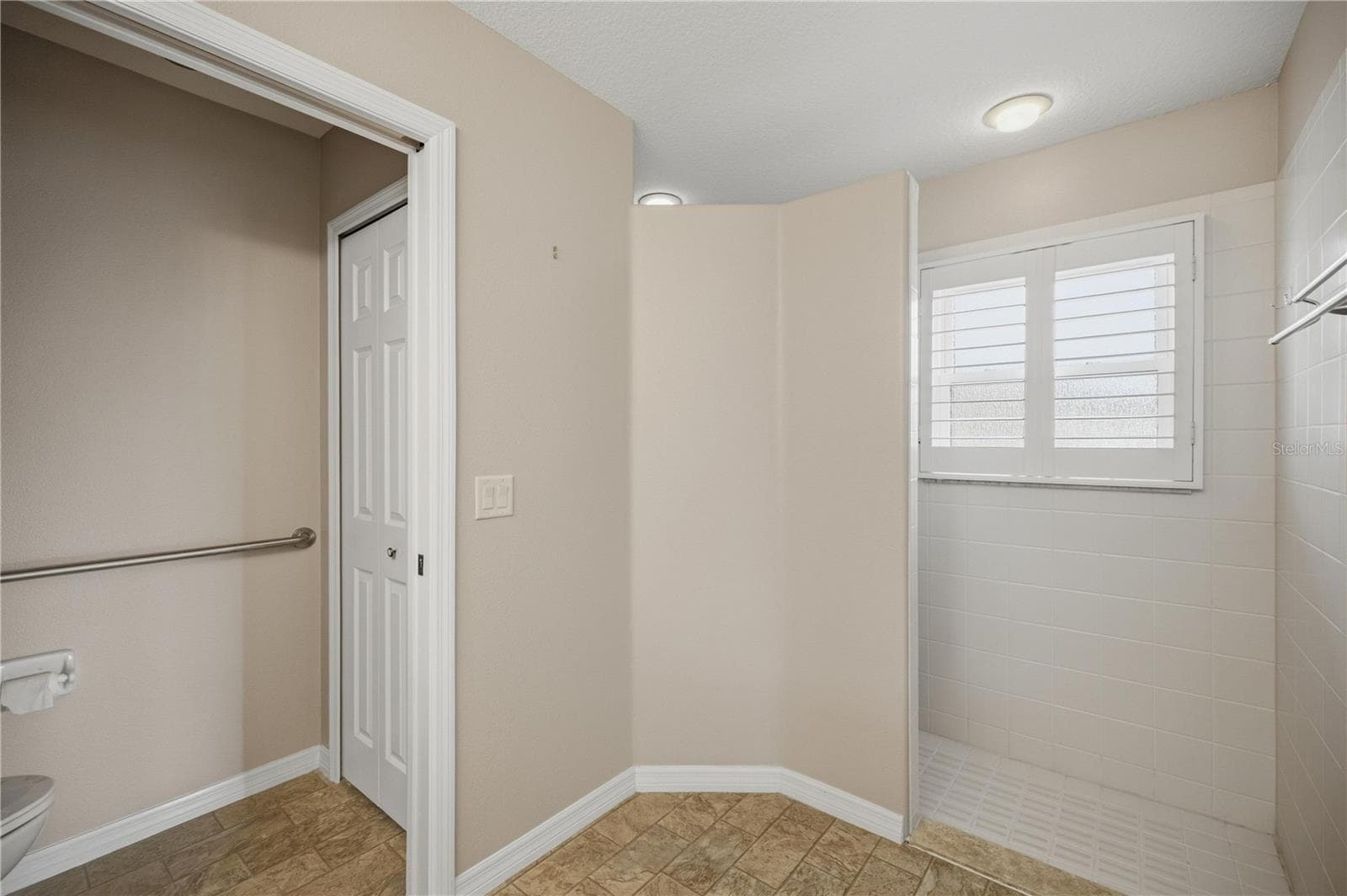 Primary bathroom with walk-in shower and private water closet - 15673 SW 11TH TERRACE RD, OCALA