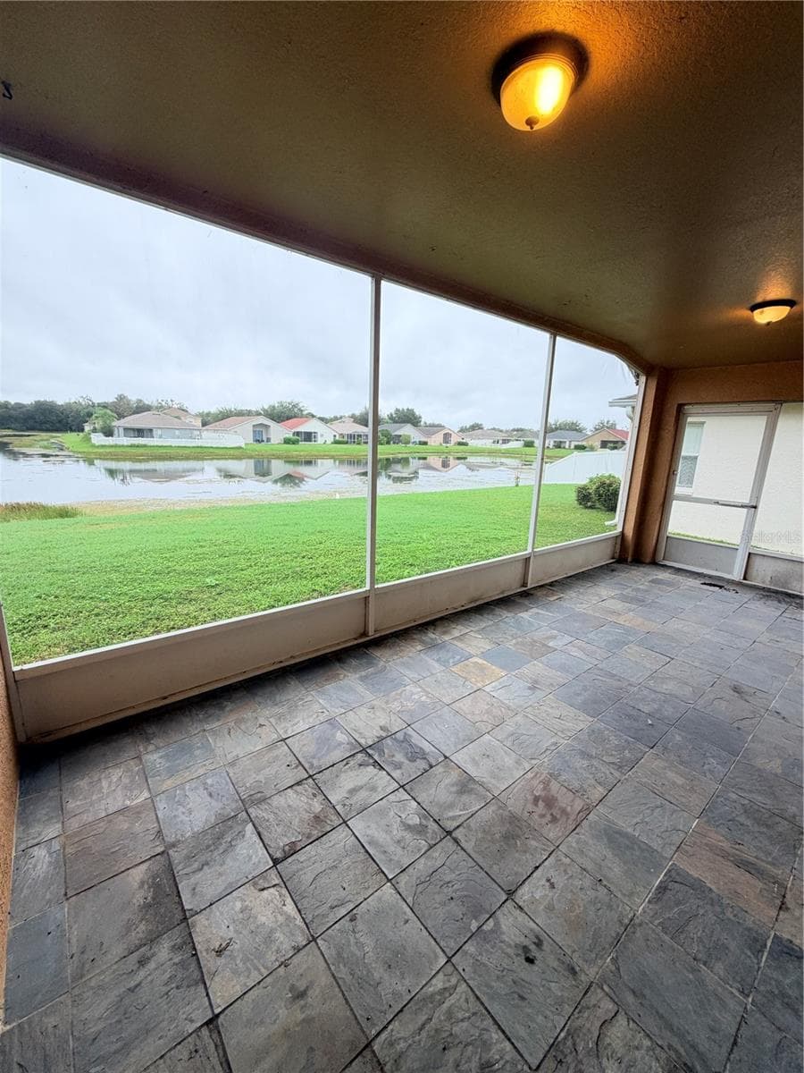 Screened-In Back Patio - 7516 TOWER BRIDGE DR, WESLEY CHAPEL