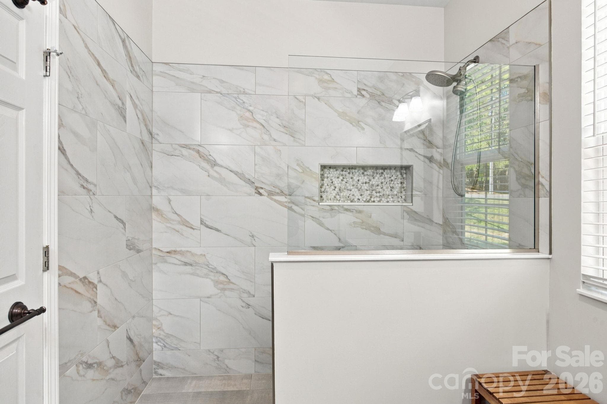 Walk-in shower main level primary suite - 3774 Gordon Road, Terrell