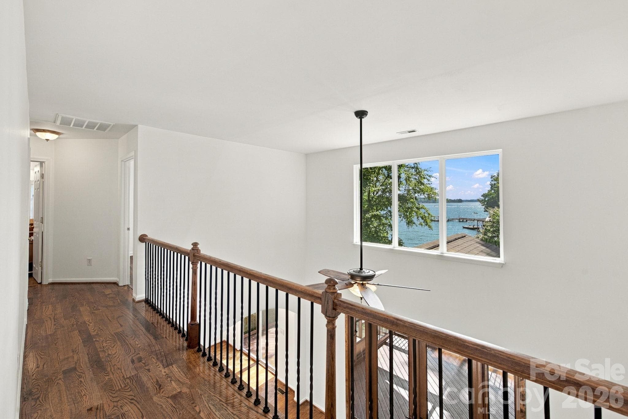 Hallway from upper level primary to additional bedrooms - 3774 Gordon Road, Terrell