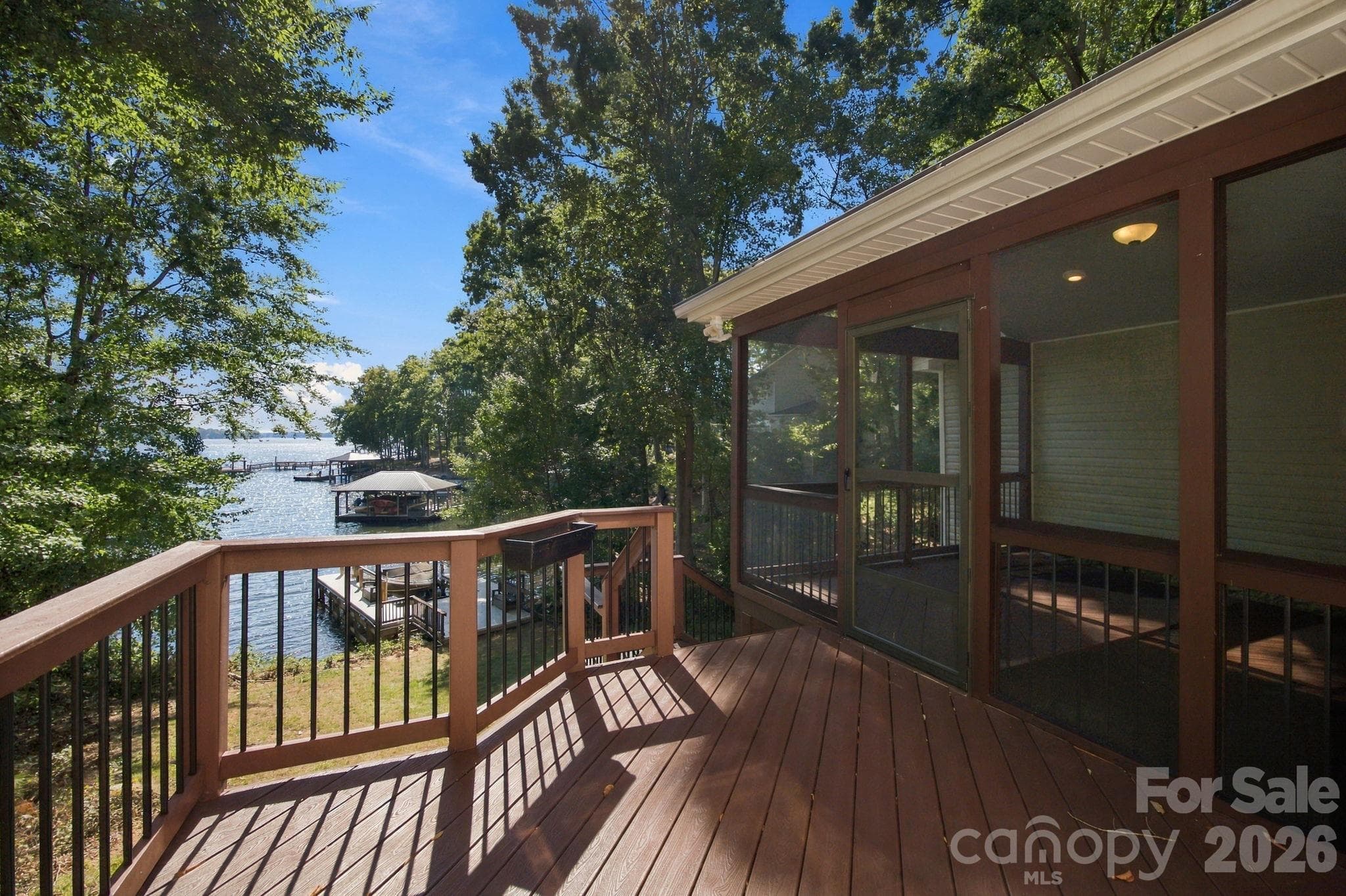 Open deck with stairs to lower deck and lake - 3774 Gordon Road, Terrell
