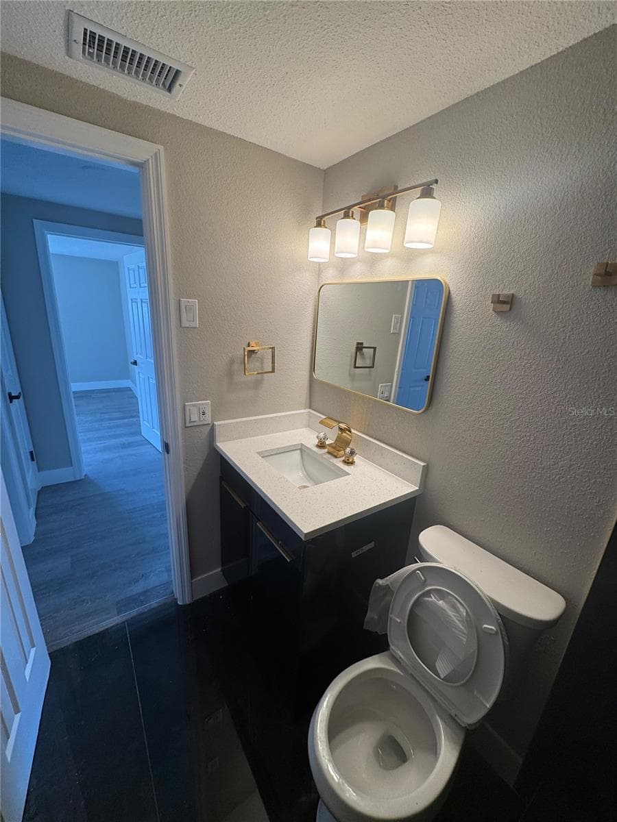 Single Family Residence at 7401 COUNTRY CLUB DR, HUDSON, photo 6 of 7