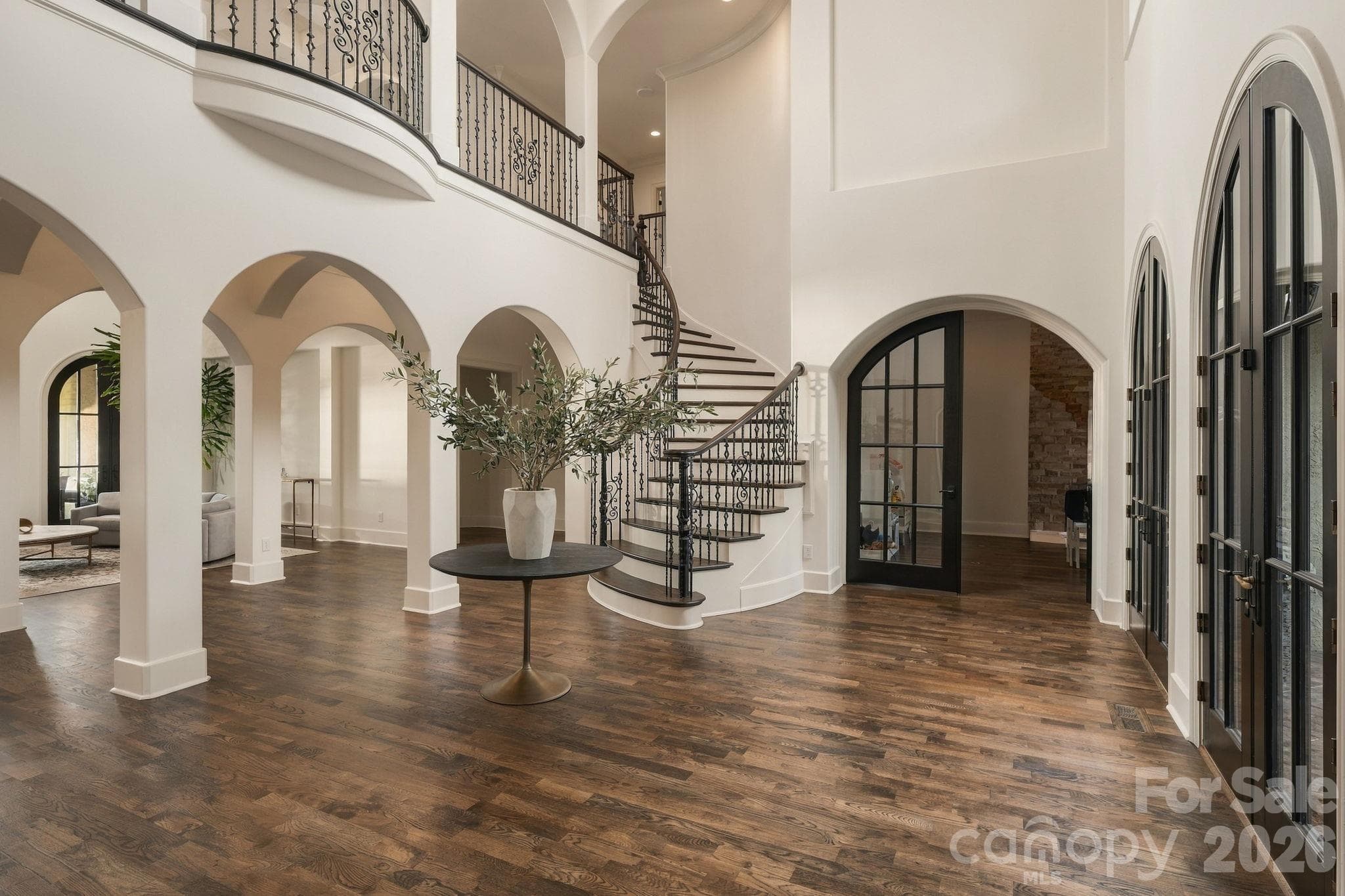 The foyer of this home, with arches, arches and more arches! - 21215 Senlac Lane, Cornelius