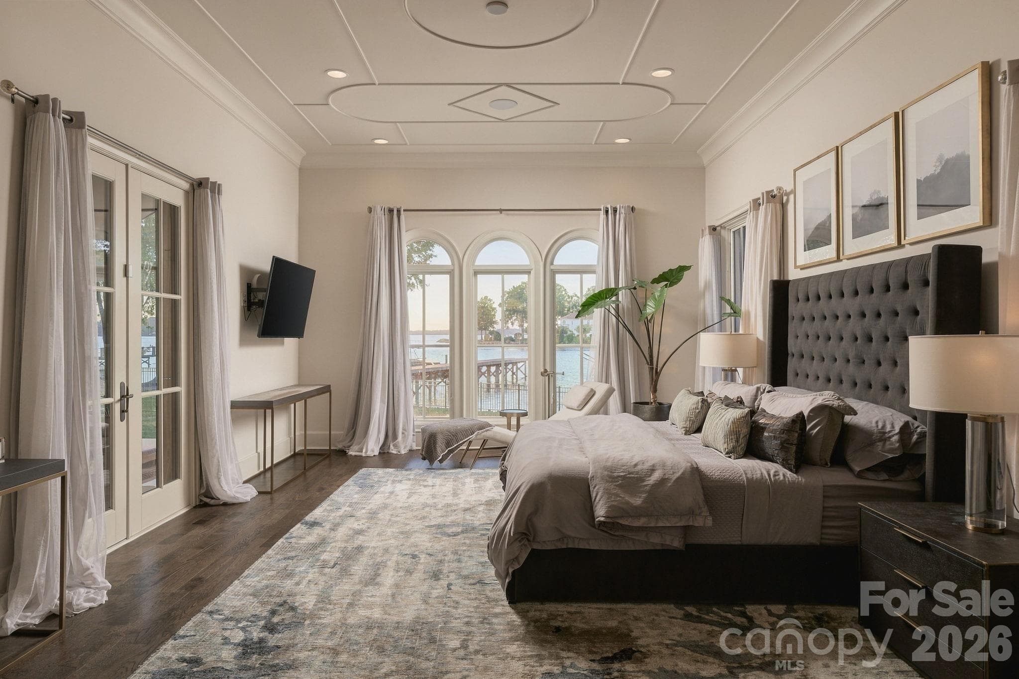 First floor primary suite with lake views and luxurious finishes. - 21215 Senlac Lane, Cornelius