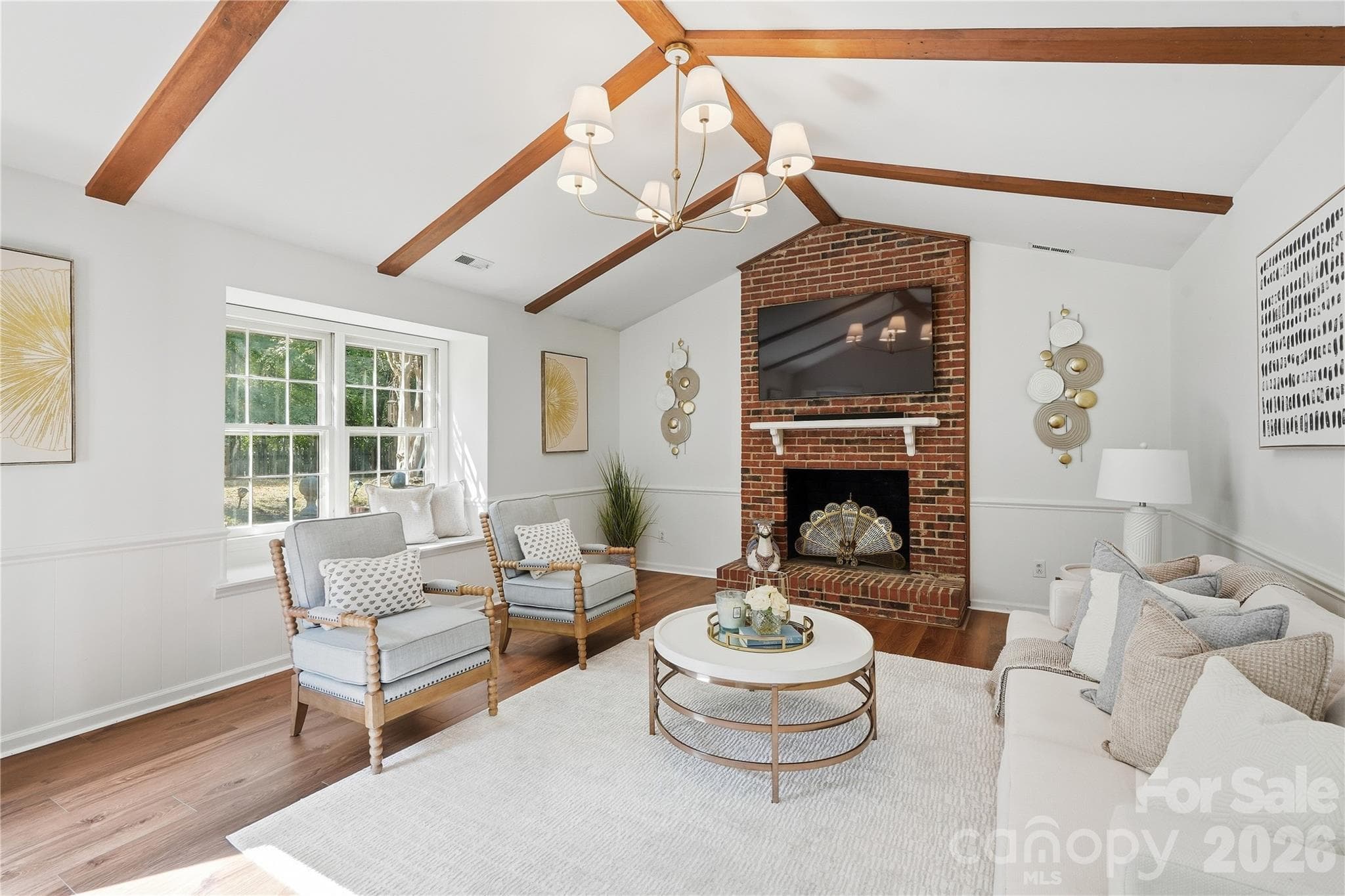 Cozy living room with wood burning fireplace - 717 Fredricksburg Road, Matthews