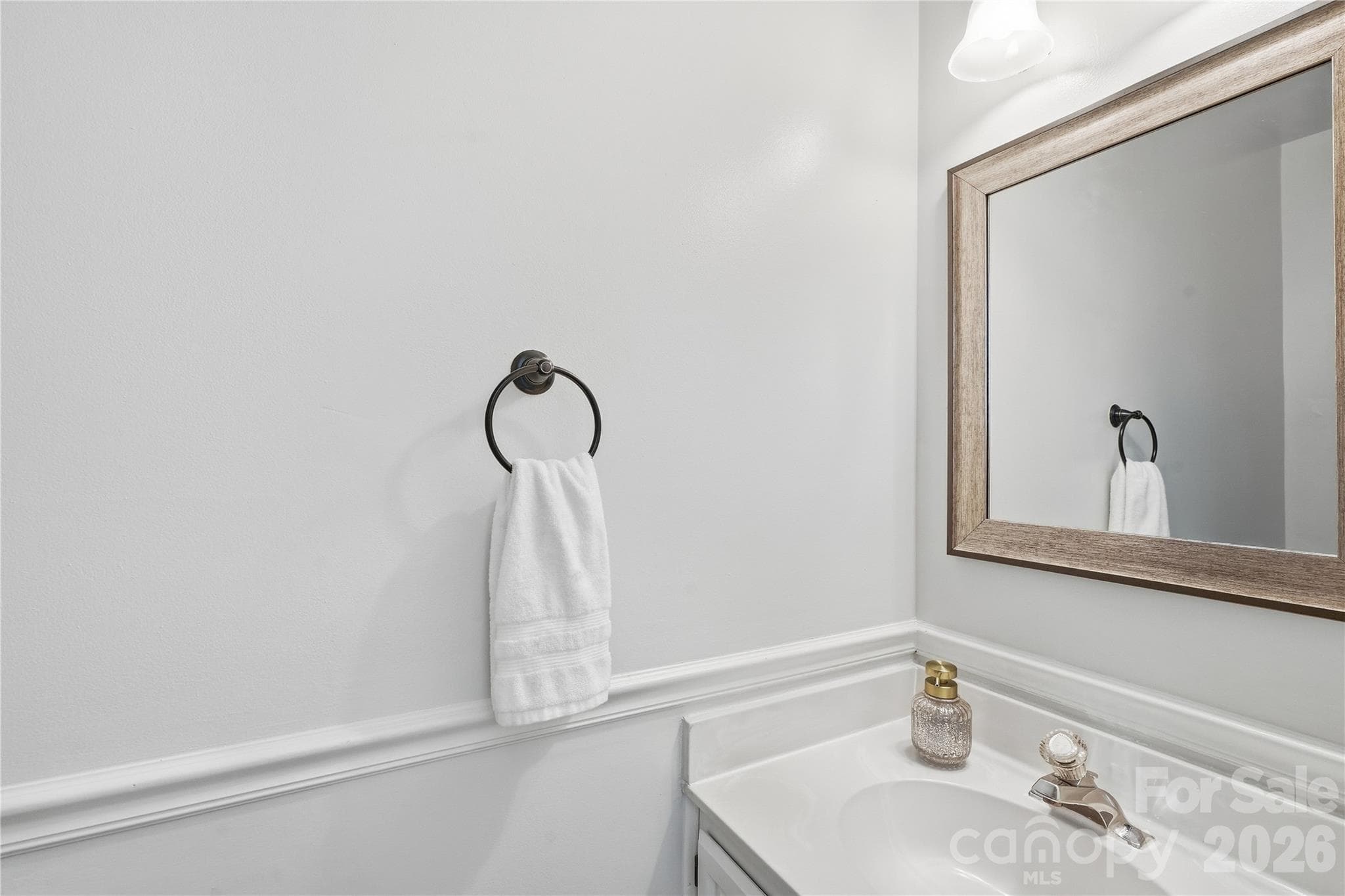 Powder room on main level - 717 Fredricksburg Road, Matthews