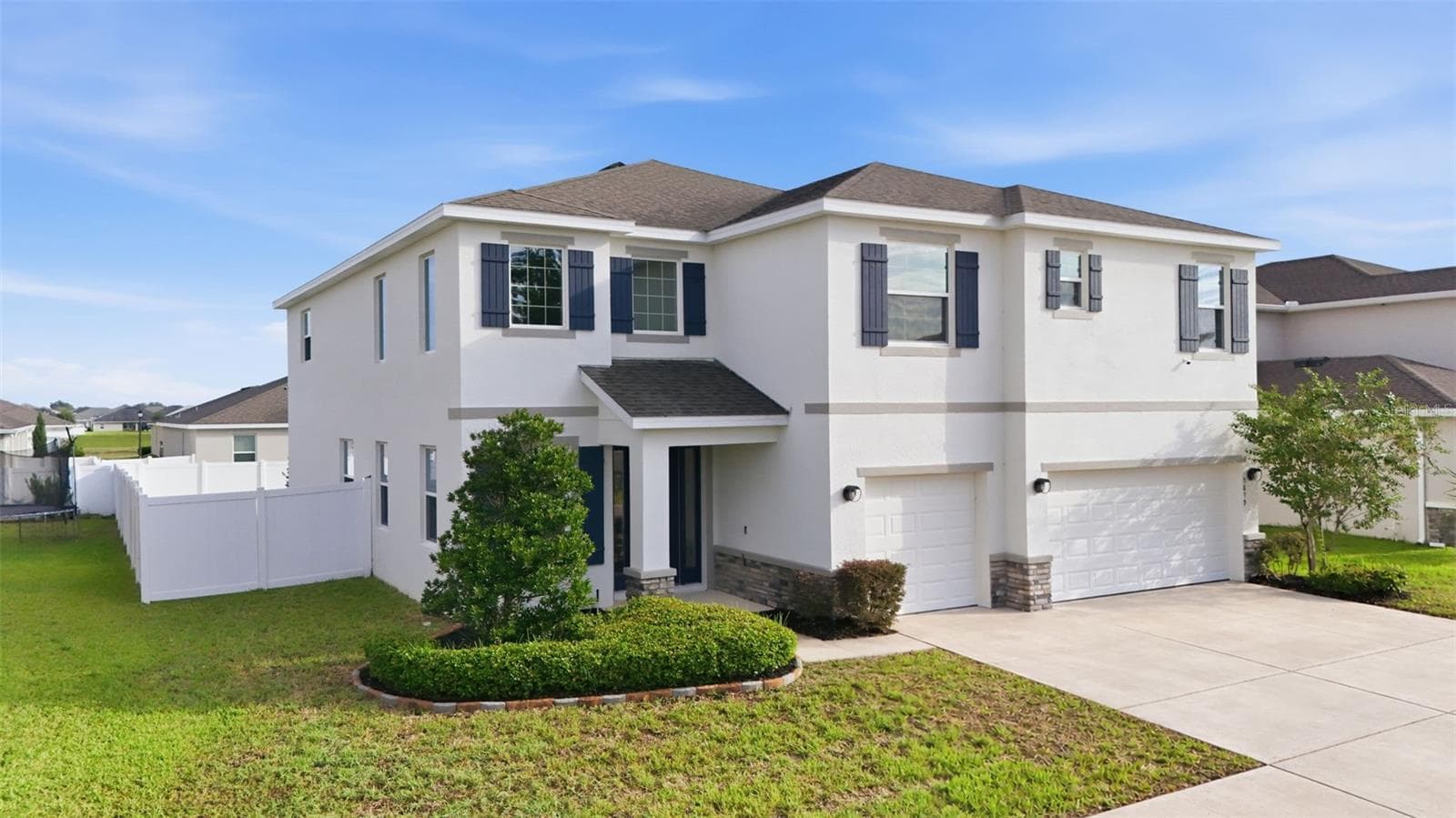 Two-story home with a 3-car garage in Brookhaven - 5839 SW 86TH ST, OCALA