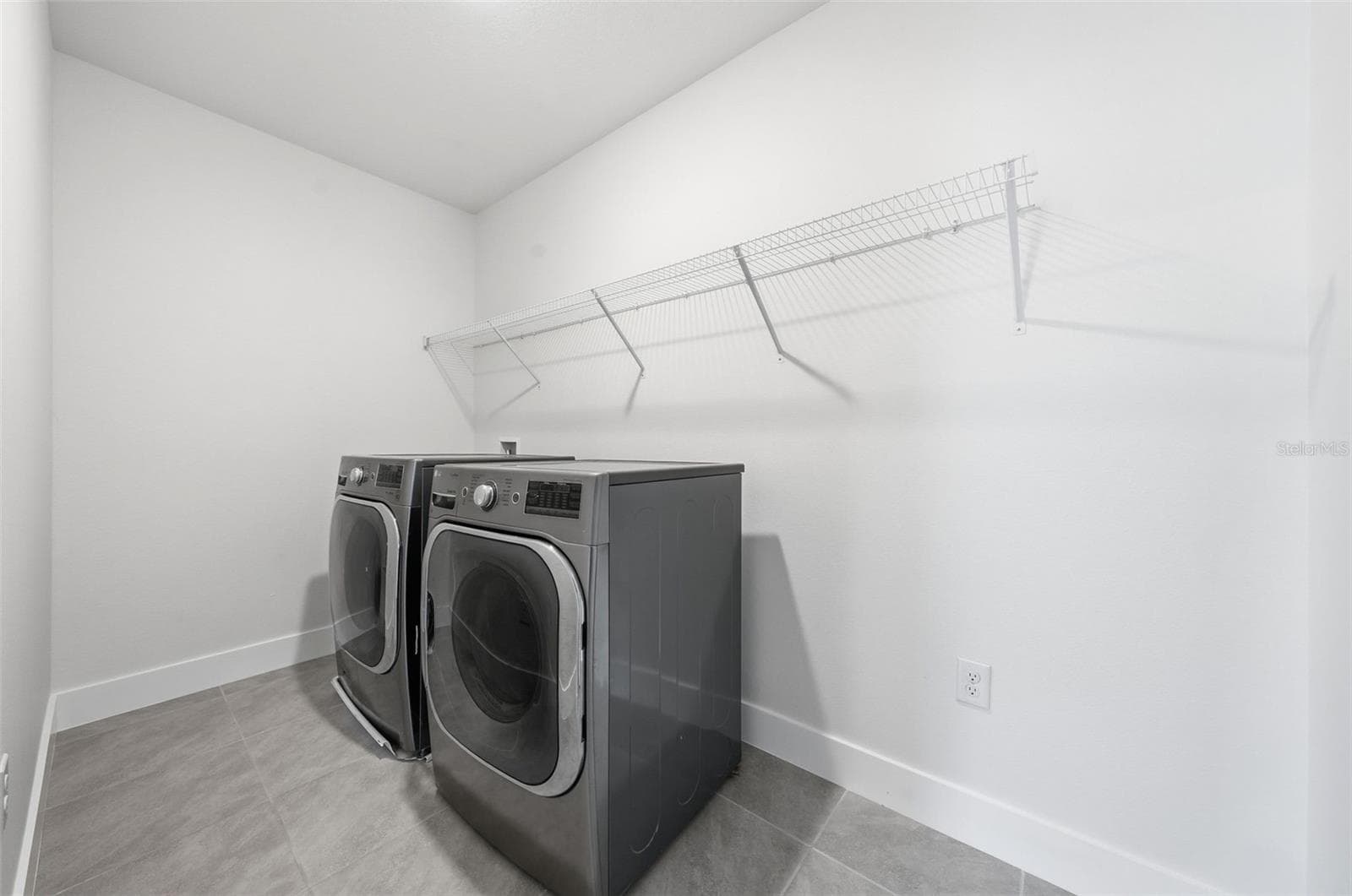 Laundry room. LG washer and dryer convey - 5839 SW 86TH ST, OCALA