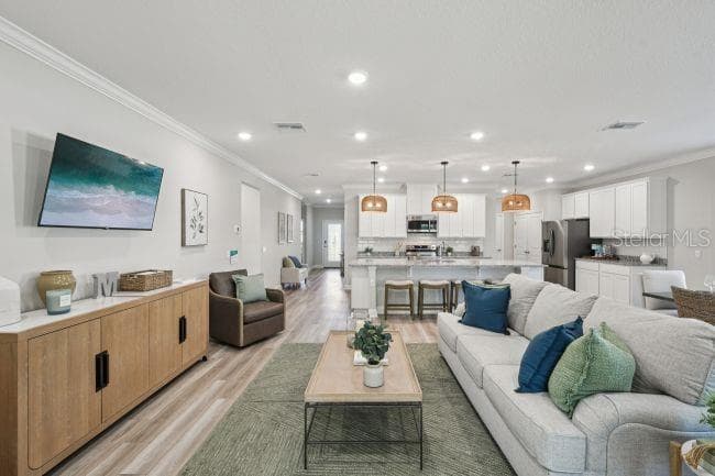 Model home - actual features may vary. - 63 LOCUST DR, OCALA