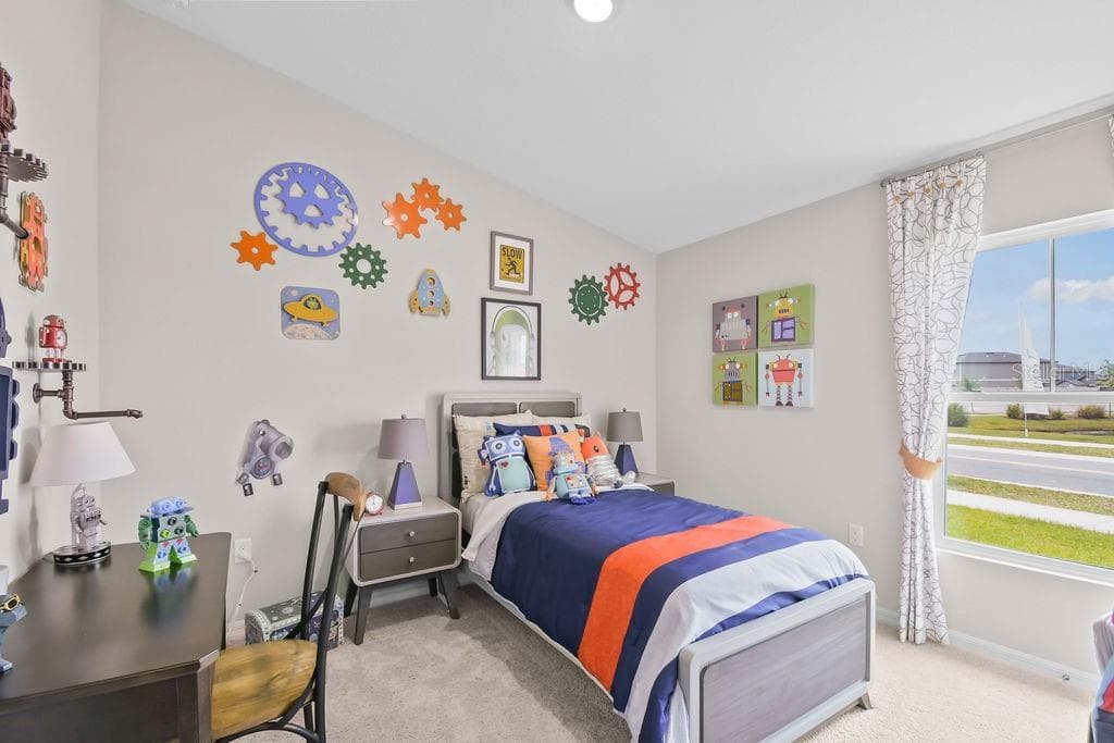 To the right when you walk in you will find 2 bedrooms to the left and full bathPrevious listing photos. Professionally staged. - 5945 SLATE ROCK DR, LAKELAND