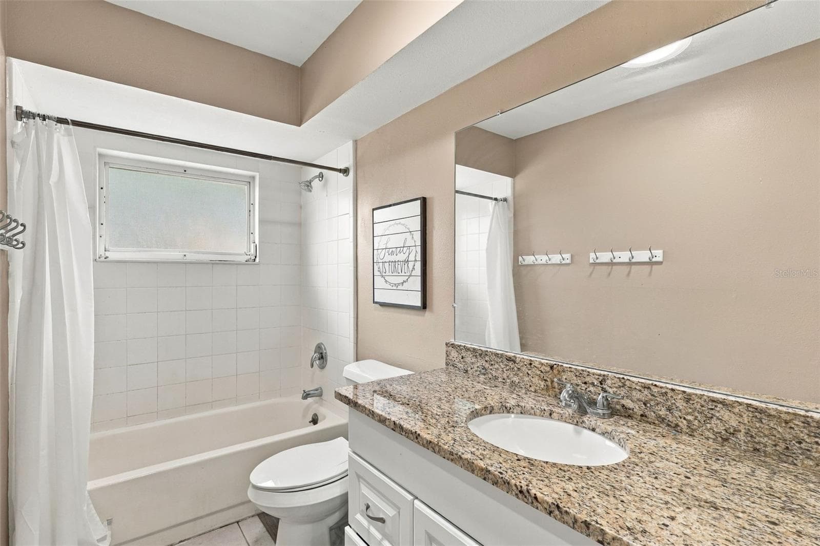 Bathroom 2- Stone countertops, bath/shower combo - 2992 INCA CT, DELTONA