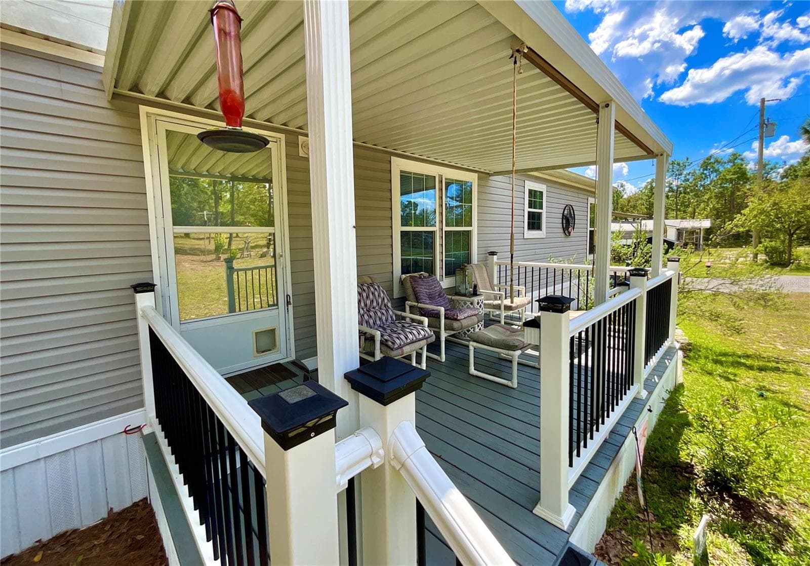 Manufactured Home at 104 SILVER DOLLAR DR, HAWTHORNE, photo 4 of 34